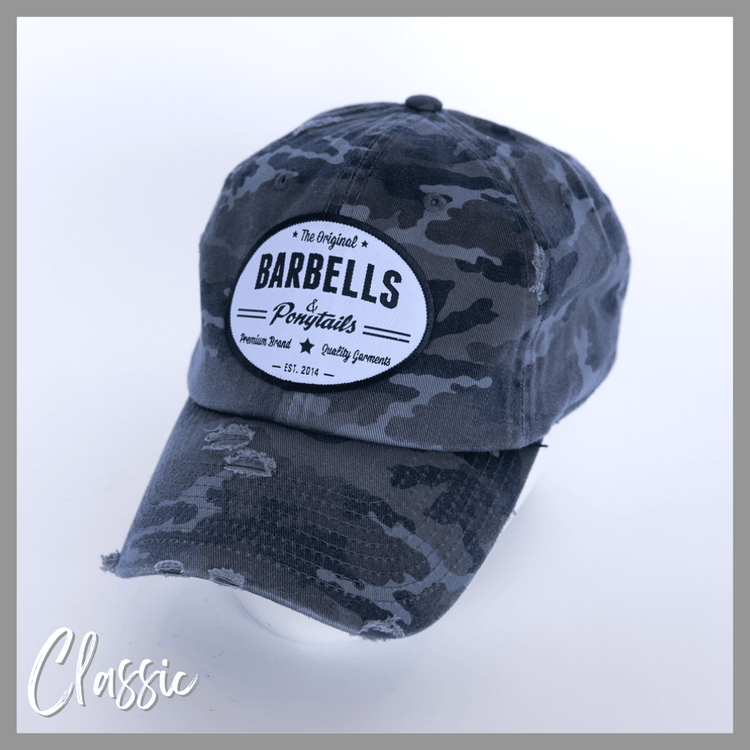 solid grey camo classic baseball hat with barbells and ponytails text